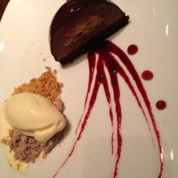 AnQi Bistro - Half Chocolate dome cake with Blackberry Coulis, Port and Hazelnut - Asian Fusion Near Me - Costa Mesa, California