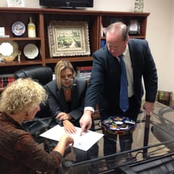 Bruch Law - Marlo pictured with Of-Counsel David E. Ryan working with a client.
