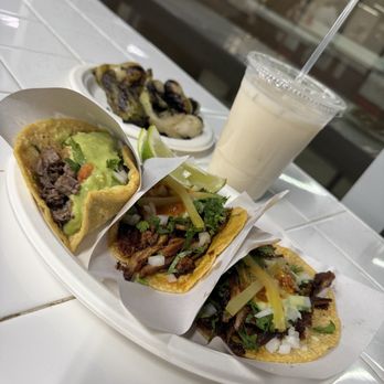 Los Tacos No. 1 - Combination of 3 types of tacos, a horchata, and a side of roasted vegetables. - Tacos Near Me - New York, New York
