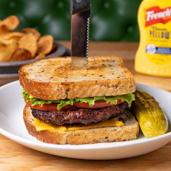 Katz's - a grilled cheeseburger with pickles and mustard - Delis Near Me - Houston, Texas Katz's - a grilled cheeseburger with pickles and mustard - Delis Near Me - Houston, Texas