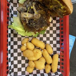 66 To Go - Mushroom-Swiss hamburger with all the fixings, and cheese curls. April, 2024.