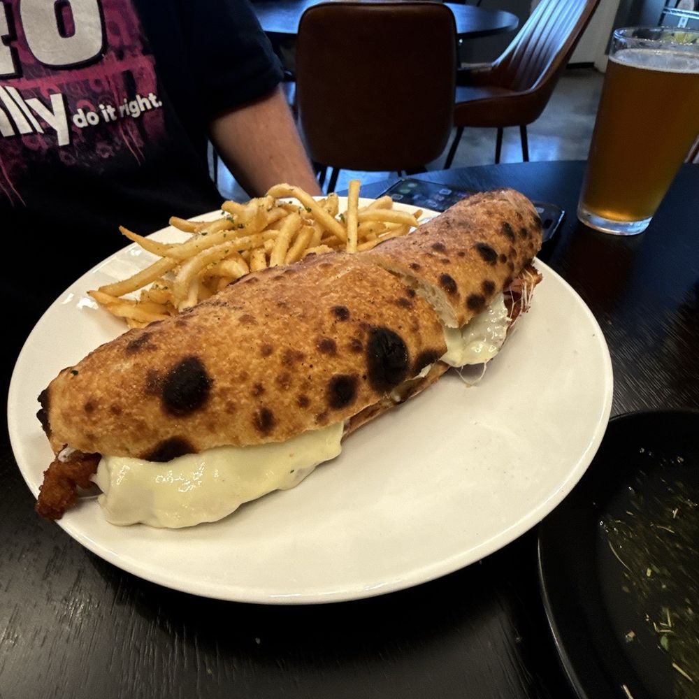 Posto Pizza - Chicken Milanese Cordon Bleu Sandwich - Pizza Near Me - Celebration, Florida Posto Pizza - Chicken Milanese Cordon Bleu Sandwich - Pizza Near Me - Celebration, Florida