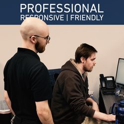 Clark Computer Services - Tim and Caleb hard at work, resolving customer issues while providing the best customer service.