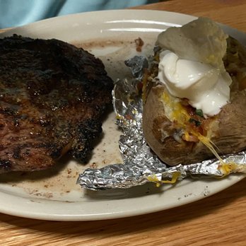 Cattleman's Roadhouse - Cowboy Rib-Eye abs loaded baked potato - Steakhouses Near Me - Danville, Kentucky Cattleman's Roadhouse - Cowboy Rib-Eye abs loaded baked potato - Steakhouses Near Me - Danville, Kentucky