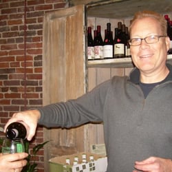 Dave the Wine Merchant - Dave the Wine Merchant pours samples for wine club members.