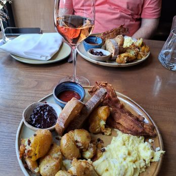 Graze - Scrambled eggs and crispy bacon and crispy potatoes and sour dough toast & homemade preserves - Bars Near Me - Canmore, Alberta