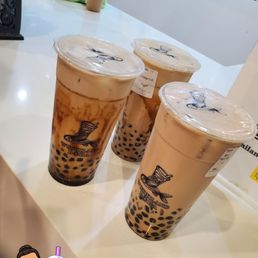Brown sugar bobas & roasted black milk tea with qq cubes Brown sugar bobas & roasted black milk tea with qq cubes