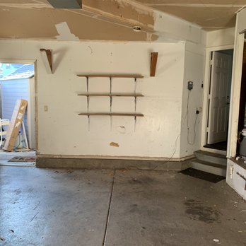 Bonilla Painting - Old Garage (No Paint, Concrete Floor, Nails/Indents in Wall, No Panels) - Painters Near Me