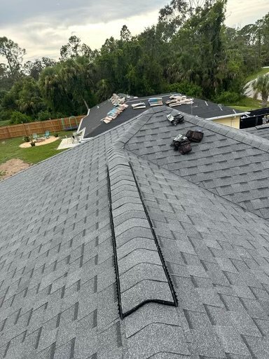 Slide of S F Roofing Quest