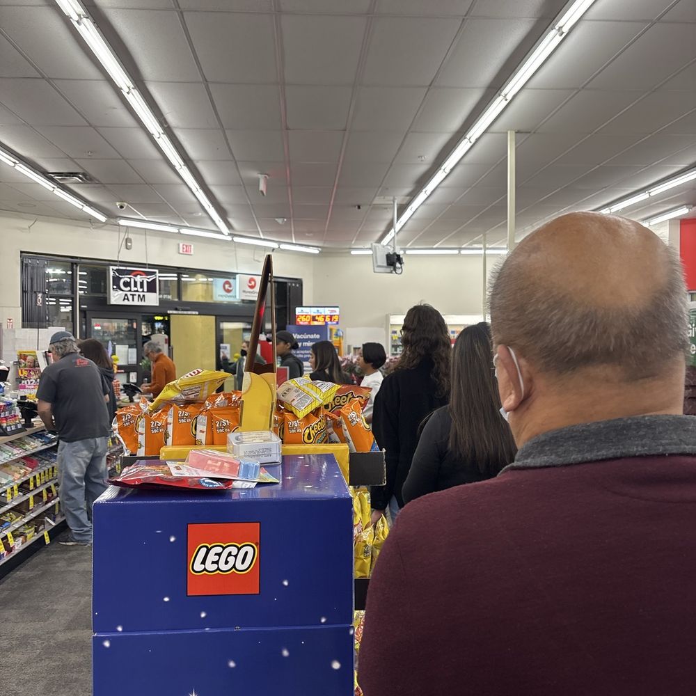 You have 20 people waiting in line and a few people press the help button to open different glass cabinets. You have 20 people waiting in line and a few people press the help button to open different glass cabinets.