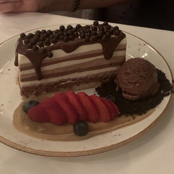Voyagers - Multi layer chocolate mouse cake. Very light. - Seafood Near Me - Orange Beach, Alabama Voyagers - Multi layer chocolate mouse cake. Very light. - Seafood Near Me - Orange Beach, Alabama