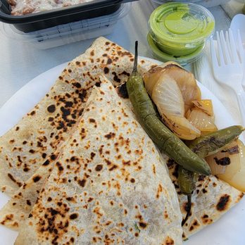 Tacos Los Gordos Estilo Tijuana - Suadero quesadilla with sides of beans and rice. - Tacos Near Me - Irwindale, California Tacos Los Gordos Estilo Tijuana - Suadero quesadilla with sides of beans and rice. - Tacos Near Me - Irwindale, California