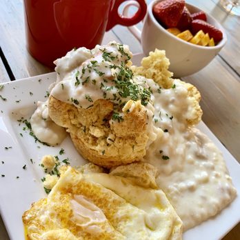 The Paramount - Biscuit & gravy, with an over easy egg & fruit on the side! - New American Near Me - Steamboat Springs, Colorado The Paramount - Biscuit & gravy, with an over easy egg & fruit on the side! - New American Near Me - Steamboat Springs, Colorado