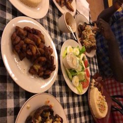 Kenedougou Grill - Lamb, attieke, plantains, salad and ginger drink