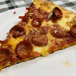 Pop’s Pizzeria - Crispy Pepperoni Pizza Slice.