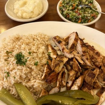 Jerusalem Garden - Chicken and hummus plate, tabouli and toum. - Desserts Near Me - Ann Arbor, Michigan Jerusalem Garden - Chicken and hummus plate, tabouli and toum. - Desserts Near Me - Ann Arbor, Michigan