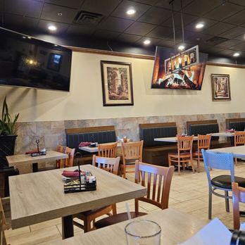 Bella Sera Italian Restaurant - Fire place on the wall (TV) - Italian Near Me - Universal City, Texas