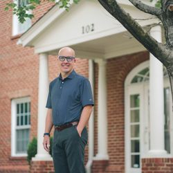 Chip Millard in front of office at 102 Market St, Chapel Hill