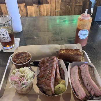 Moe's Original Bar B Que - How can you go wrong with this in front of you? Ribs, slaw, baked beans and corn bread. - Barbeque Near Me - Wilmington, North Carolina