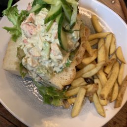 Lobster roll with picks and chips. Very creamy. Lobster roll with picks and chips. Very creamy.