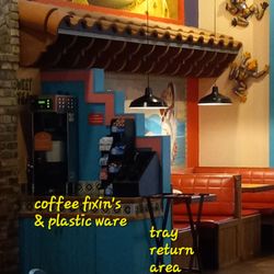 Rosa's Café & Tortilla Factory - Inside where to get plasticware & tray retun area. Coffee fixings area, too!
