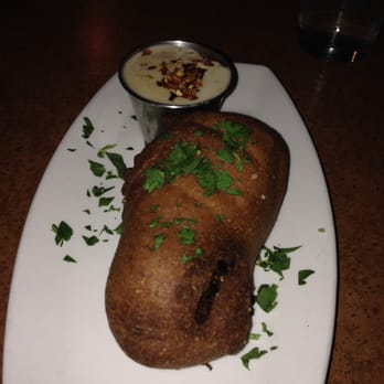 Common Theory - garlic bacon wrapped corn dog with mornay sauce. - Gastropubs Near Me - San Diego, California Common Theory - garlic bacon wrapped corn dog with mornay sauce. - Gastropubs Near Me - San Diego, California
