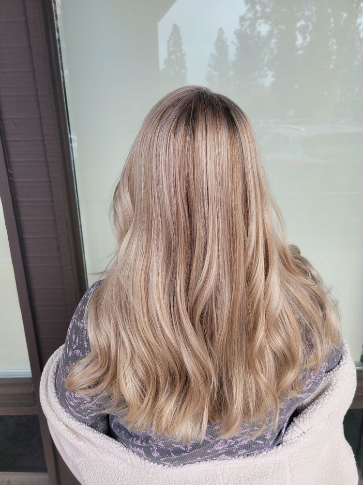 Armida's Hair Studio Logo