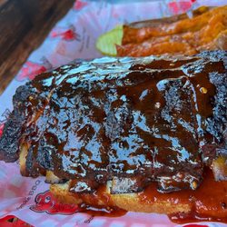 Rick's Rollin Smoke Bbq & Tavern - Baby back ribs combo with sweet potato.