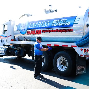 Express Septic & Drain Cleaning - Technician putting on gloves before he begins his work. - Septic Services Near Me - Nampa, Idaho Express Septic & Drain Cleaning - Technician putting on gloves before he begins his work. - Septic Services Near Me - Nampa, Idaho