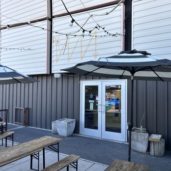 Bow & Arrow Brewing - patio area with tables and umbrellas - Breweries Near Me - Albuquerque, New Mexico Bow & Arrow Brewing - patio area with tables and umbrellas - Breweries Near Me - Albuquerque, New Mexico