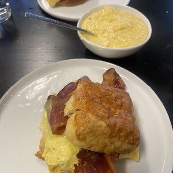 Local Loaf - Bacon egg and cheese biscuit, cheese grits, sausage egg and cheese on brioche bun - Bakeries Near Me - Charlotte, North Carolina