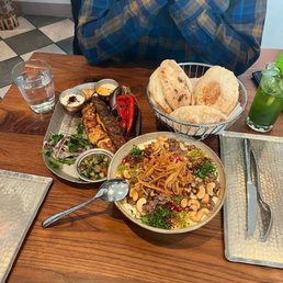 Two different kebabs and fatteh humus. So much food and so delicious. Two different kebabs and fatteh humus. So much food and so delicious.