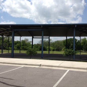 Northeast Metropolitan Park - Covered, full basketball court w 2 picnic tables. - Parks Near Me - Pflugerville, Texas
