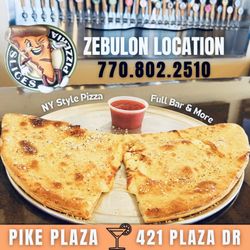 Slices Pizzeria - Calzones and 30+ Domestic and Imported Beer on Tap!