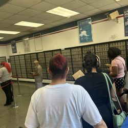 US Post Office - Always one person working and a extremely long line