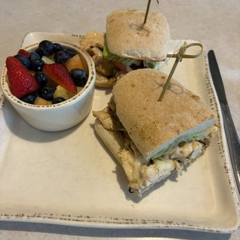 The Egg - Pesto Chicken sandwich with a side of fruit. - Breakfast & Brunch Near Me - Steamboat Springs, Colorado