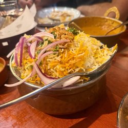 Kachiguda Junction - Hyderabadi Chicken Dum Biryani. Spicy and tasty. Dal Makni in back.