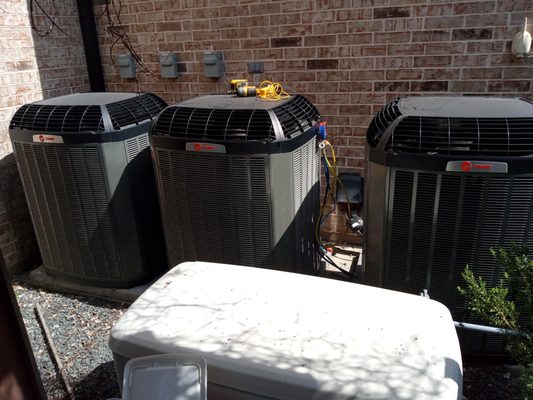 Trane 20 SEER AC Installation Cypress TX. - One Day Trane AC Replacements in Cypress, TX. We completed it in one day. It resulted in a lot of referrals and additional work. It included all new duct work replacement on each system.
3 Trane XV20 Communicating Variable Speed Dual Fuel Hybrid Heat Pump Systems. Configured for dual fuel operation, meaning the customer and his family can switch back and forth between heat sources. The gas furnaces's are going to be his emergency heat which heat the house faster than heat pump mode, best for when it gets below freezing outside. The more comfortable heat pump mode is programmed as the primary heat source which is perfectly suited for our climate here in Houston.
The new cypress duct work installation was done with all new medical grade antimicrobial R8 premium ducting with 25 years warranty and guaranteed even air balancing for 25 years also. This house also has two of these systems zoned. Each bedroom has its own thermostat with a series of motorized communicating (wireless) dampers to allow exact temperature control for each individual room. Greater Houston Trane AC Repair & Replacement Services with Gilberts Air Specialist a Trane Comfort Specialist & Authorized Trane Dealer. GilbertsAC.com