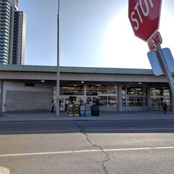 Leslie Station - Looking at the unstaffed bus bay entrance from across the street at passenger pickup. May 2018