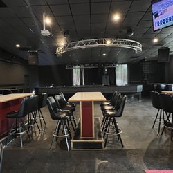 Neisen's Sports Bar & Grill - Stage for the bands and large tables for larger groups.