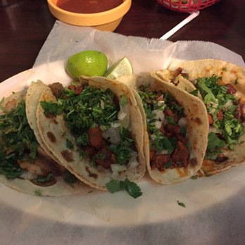 Santana Mexican Grill - Al pastor tacos and a fish taco - onions and cilantro - the real way to eat tacos with some lime. Perfect ! - Mexican Near Me - Cartersville, Georgia Santana Mexican Grill - Al pastor tacos and a fish taco - onions and cilantro - the real way to eat tacos with some lime. Perfect ! - Mexican Near Me - Cartersville, Georgia