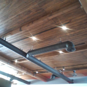 Uroko Poke - industrial design ceiling is trending, but this looks clean with wood boards - Japanese Near Me - Costa Mesa, California
