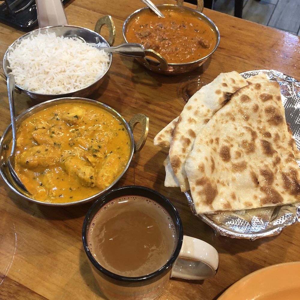 Chi tea, mango chicken, rice, lamb marsala, and butter naan