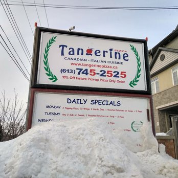 Tangerine Pizza - The sign in the parking lot (covered in snow because it's winter in Canada, lol). - Pizza Near Me - Ottawa, Ontario