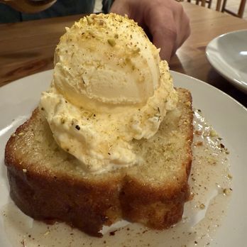 Macizo Restaurant - Seasonal pear pound cake a la mode with crushed pistachios - Peruvian Near Me - Indianapolis, Indiana