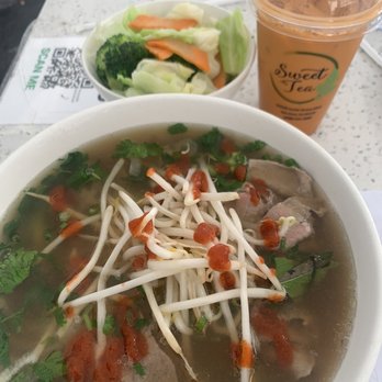 Pho 24 - 3. Round Steak Pho with steamed vegetables on the side and a Thai tea - Vietnamese Near Me - San Jose, California Pho 24 - 3. Round Steak Pho with steamed vegetables on the side and a Thai tea - Vietnamese Near Me - San Jose, California