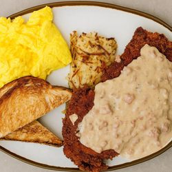 The Breakfast Counter - Chicken fried steak with scrambled eggs, hashbrowns, and buttered sourdough toast.