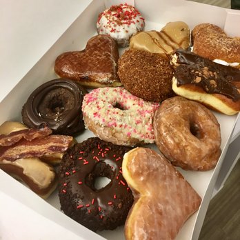 Doughnut Dollies - A dozen donuts. Loved the Valentine's Day Xs and hearts to complement the classic O. - Breakfast & Brunch Near Me - Marietta, Georgia Doughnut Dollies - A dozen donuts. Loved the Valentine's Day Xs and hearts to complement the classic O. - Breakfast & Brunch Near Me - Marietta, Georgia