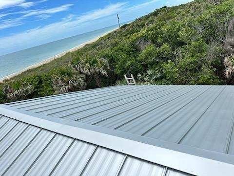 Slide of Charles Conry Roofing