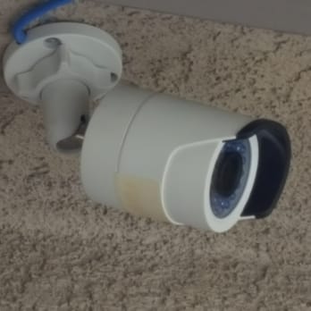 American Electric Company - Drilled through stucco to run cable. - Electricians Near Me